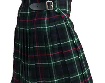 May include: A green, red, and white plaid kilt with black leather straps and buckles.