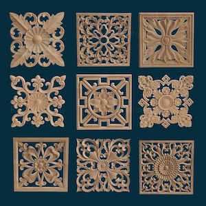 May include: Nine wooden decorative wall panels with intricate floral designs. Each panel features a different pattern with carved details and a light brown finish.