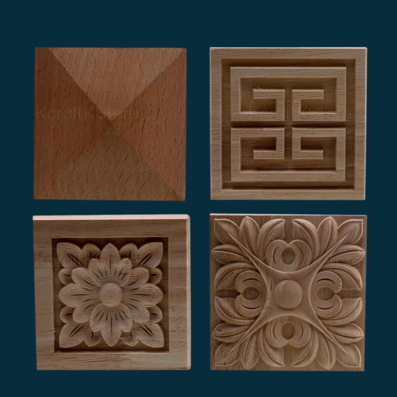 May include: Four wooden square tiles with different carved designs. The first tile has a pyramid shape carved into the surface. The second tile has a Greek key pattern carved into the surface. The third tile has a floral design carved into the surface. The fourth tile has a more intricate floral design carved into the surface.