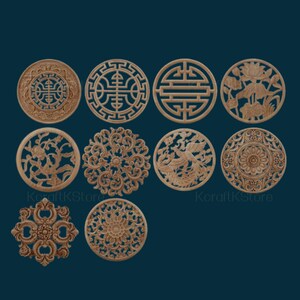 May include: Ten round wooden plaques featuring intricate carvings of traditional Chinese designs. The designs include flowers, birds, geometric patterns, and symbols. The plaques are all the same size and are made of light brown wood.