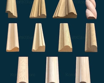 May include: A collection of unfinished wooden molding samples, showcasing various profiles and designs. The samples include decorative edges, angled cuts, and a twisted rope-like design. The wood has a natural, light brown color, ideal for woodworking projects.