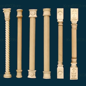May include: Six decorative wooden columns in various designs. The columns are light brown and feature detailed carvings, including fluted shafts, floral patterns, and a spiral design. They stand against a dark teal background.