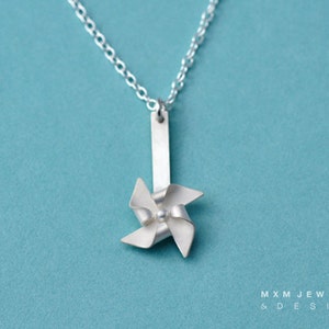 Handfolded Spinnable Sterling Silver Pinwheel Necklace post up image 1