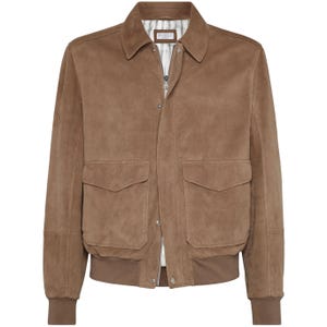 May include: A brown suede bomber jacket with a collared neckline, two front pockets, and a ribbed hem and cuffs. The jacket has a zip-up closure and a button at the collar. The interior lining is visible at the collar.