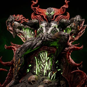 May include: A detailed Spawn action figure sitting on a throne made of dark, organic textures and skulls. The figure features a black suit with white chest markings, a flowing red cape, and glowing green eyes, surrounded by green light accents.