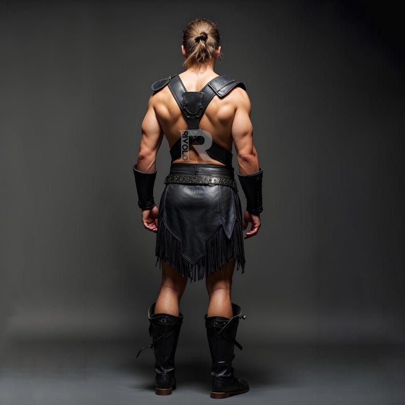 May include: A person wearing a black leather kilt with fringe, a black leather harness with straps, and black leather arm guards. The person is standing with their back to the camera.