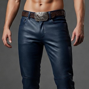 May include: Navy blue leather pants with a decorative belt buckle. The pants have a classic five-pocket design and a fitted silhouette. The belt is brown with a silver buckle.