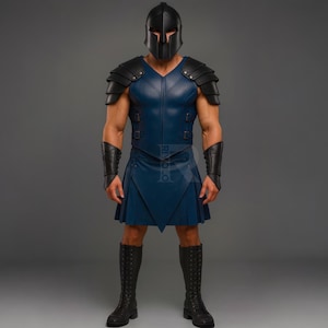 May include: A full-body shot of a warrior costume. The outfit includes a black helmet, shoulder armor, a blue leather tunic, a pleated skirt, arm cuffs, and knee-high boots. The costume is designed with a focus on protection and a historical aesthetic.