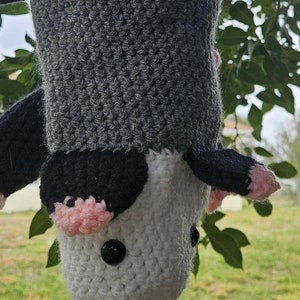 Possum plastic bag holder