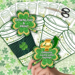 May include: A collection of printable coffee cup sleeves and matching shamrock decorations. The design features green and gold glitter accents, with text that reads "Download & Print" and "Lucky Latte Life". The image also includes scissors.