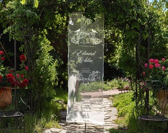 Könnte beinhalten: Transparente Hochzeitsanzeige mit der Aufschrift "Welcome to the Wedding of Edward & Chloe" in eleganter Schrift. Das Schild ist mit dekorativen Verzierungen und Vogelsilhouetten versehen. Es befindet sich in einem Garten.