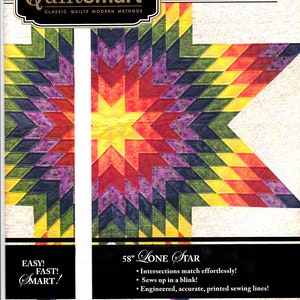 May include: A colorful Lone Star quilt pattern with a star design in shades of red, yellow, purple, and green. The pattern is 58 inches in size and features printed interfacing for easy sewing. The text on the pattern reads "Quiltsmart" and "Easy! Fast! Smart!"