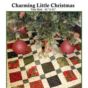 May include: A quilted Christmas tree skirt with a patchwork design. The skirt is 41 x 41 inches and features squares of red poinsettias, green foliage, and black swirls on a cream background. The text "Charming Little Christmas" is at the top.