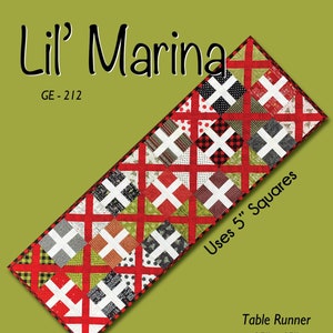May include: A table runner with a patchwork design featuring red, white, black, and green squares. The runner is 15 inches wide and 45 inches long. The text "Lil' Marina" and "GE-212" are at the top. The text "Uses 5" Squares" and "Table Runner" are also visible.