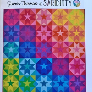 May include: A quilt pattern titled AEROSTAR by Sarah Thomas of SARIDITTY. The cover features a colorful grid of star-shaped blocks in a rainbow gradient. Text includes finished size 60 inches by 60 inches, skill level confident beginner, and 25-piece FQB.