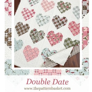 May include: A patchwork quilt with heart-shaped designs in floral and patterned fabrics. The quilt is set against a white backdrop and is labelled "Double Date". The website address www.thepatternbasket.com is also visible.