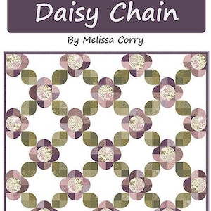 May include: A quilt pattern titled "Daisy Chain" by Melissa Corry. The design features a repeating floral pattern in shades of purple, green, and cream on a white background. The text "fat quarter friendly in 6 sizes" is also visible.