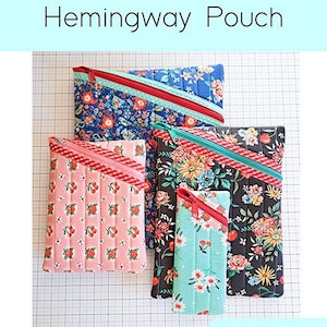 May include: Four quilted zipper pouches in various floral patterns and sizes. Each pouch has a diagonal zipper and a contrasting fabric border. The text "Hemingway Pouch" is at the top, with "Quilted Zipper Pouch Pattern in Four Sizes" below.