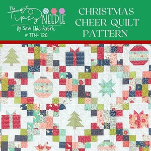May include: Christmas Cheer quilt pattern featuring a patchwork design with gift boxes, Christmas trees, and ornaments. The quilt is made with various fabrics in red, green, blue, and white. Finished quilt size is 50" x 70".