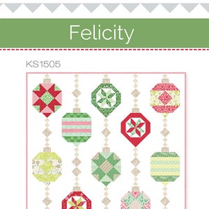 May include: A quilt pattern named "Felicity" showing Christmas ornament designs in red, green, and white. The ornaments are suspended from diamond-shaped strings. The Kate Spain logo is at the bottom.