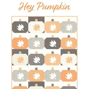 May include: A quilt pattern featuring a grid of pumpkin designs in shades of orange, gray, and white. The words "Hey Pumpkin" are written in an orange script, with "Chelsi Stratton Designs" below. The pattern is labeled "Fat Quarter Friendly."