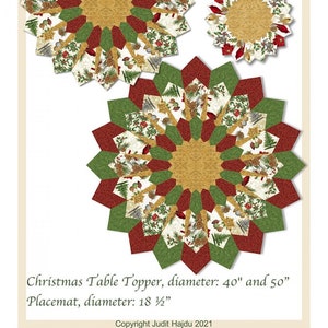May include: A Christmas table topper and placemat pattern featuring a red, green, and gold starburst design with a white background. The table topper is available in 40 inch and 50 inch diameters, and the placemat is 18 1/2 inches in diameter. The pattern is called "Quilt FOX Design".