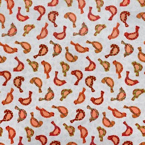 May include: A white fabric with a repeating pattern of stylized birds in shades of orange, red, and green. The birds are set against a backdrop of subtle floral designs. The top and bottom edges feature labels with words like "DAD", "MOM", and "Grandma".