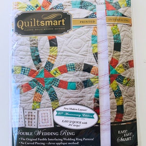 May include: Quiltsmart Double Wedding Ring quilting pattern with a colorful, modern design. The pattern is easy and quick to make with 2 1/2 inch strips. The original fusible interfacing wedding ring pattern. No curved piecing - clever applique method. Quiltsmart methods & interfacing yield beautiful results.