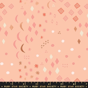 May include: A pink fabric with a repeating pattern of white, gold, and pink geometric shapes, including diamonds, stars, and crescent moons.