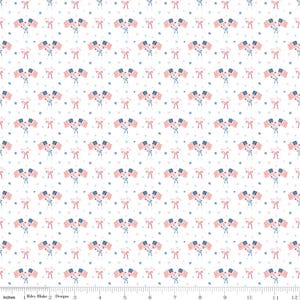 May include: White fabric with a repeating pattern of American flags, bows, and stars in red, white, and blue. The design includes small, detailed illustrations of the flags and festive elements, perfect for patriotic projects.