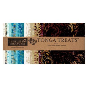May include: A stack of fabric squares labeled Tonga Treats by Timeless Treasures. The fabric features a gradient of colors from light blue and teal to cream, tan, and dark brown with batik-style patterns. The label states 5 x 5 inches and 100% cotton.