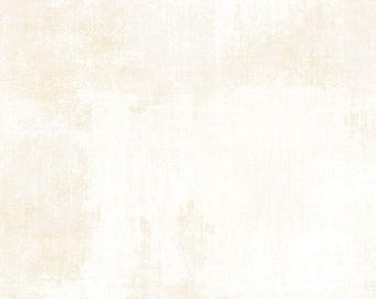 May include: A textured, off-white background with subtle variations in tone. The surface has a slightly distressed appearance, with visible brushstroke-like patterns and a soft, muted color palette. The overall effect is a vintage or aged aesthetic.