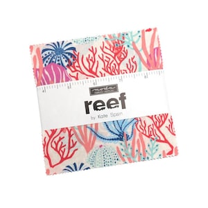 May include: A stack of fabric squares with a colorful coral reef pattern. The design features red, pink, and blue coral on a white background. The text "reef" and "by Kate Spain" are visible on the packaging.