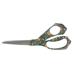 May include: A pair of scissors with a dark green handle featuring a detailed floral pattern of yellow and orange flowers with green leaves. The blades are made of silver-toned metal and are joined by a central screw mechanism.