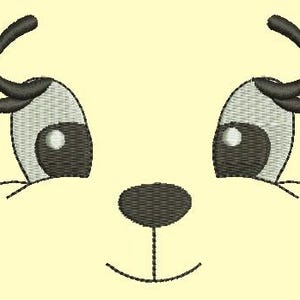 May include: An embroidered design of a cartoon animal face, featuring large, expressive eyes with eyelashes and curved eyebrows. The nose is oval-shaped, and a curved line forms the mouth. The design is in shades of gray and black on a light yellow background.