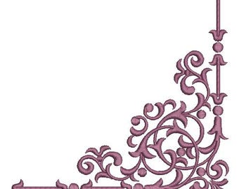 May include: A decorative corner design in a muted purple color. The design features ornate scrollwork, arrows, and circular elements, creating a vintage or antique aesthetic. The design is suitable for embroidery, scrapbooking, or other craft projects.