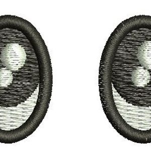 May include: Embroidered design of two cartoon eyes. Each eye is oval-shaped with a black outline and eyelashes. The irises are black with two white circles. The lower part of the eye is white.