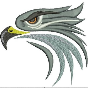 May include: Embroidered design of an eagle's head in profile. The eagle features gray feathers, a yellow and black beak, and a detailed eye with brown and white accents. The design is set against a white background.