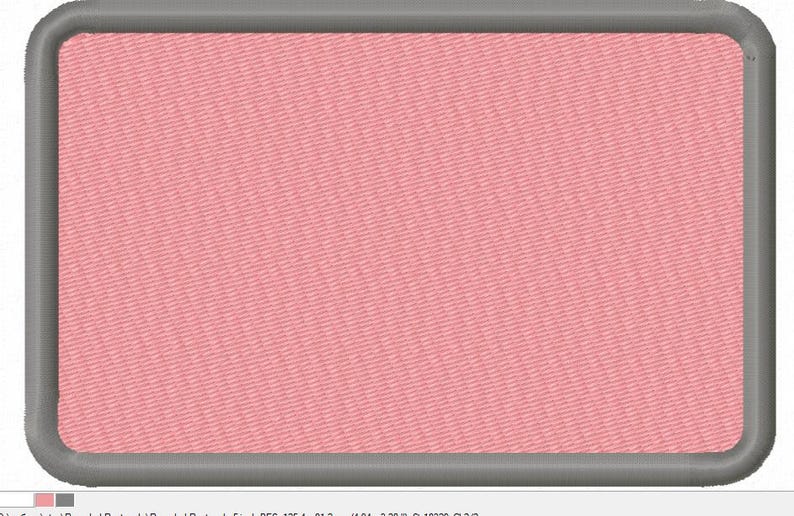 May include: A pink fabric patch with a gray border. The patch is rectangular and has a textured surface.