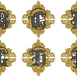 May include: A collection of ten ornate, gold-colored embroidered patches, each featuring a different letter of the alphabet in a gothic font. The letters are dark gray and set against a detailed, floral-like background.