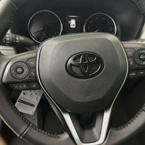 Matte Black Steering Wheel Emblem Cover – Universal Fit for Tacoma, Tundra, 4Runner, Camry, RAV4, Corolla – Premium ABS Badge Upgrade