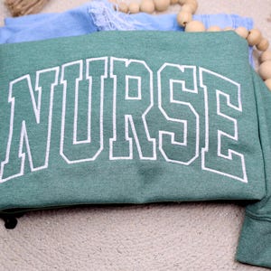 Personalized Embroidered Nurse Sweatshirt | Custom Crew Neck for Nurses | Gift for Nurse | Comfortable Nursing Apparel | Nurse Appreciation
