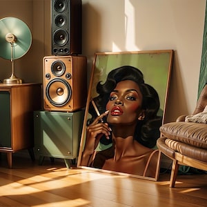 May include: A framed portrait of a woman with dark hair and red lipstick leans against a wall. A vintage stereo system with speakers and a record player sits nearby. A green lamp and a brown leather armchair complete the scene.