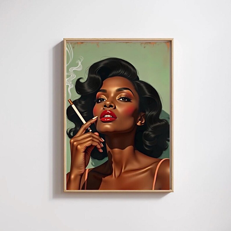 May include: A framed art print depicting a woman with dark skin, red lipstick, and a cigarette. The woman has black, wavy hair and is set against a green background. The artwork is in a vintage pin-up style, with a retro aesthetic.