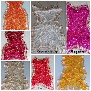 May include: Six different colored sheer scarves with gold embroidery and trim. The colors are orange, cream, magenta, beige, red, and yellow.