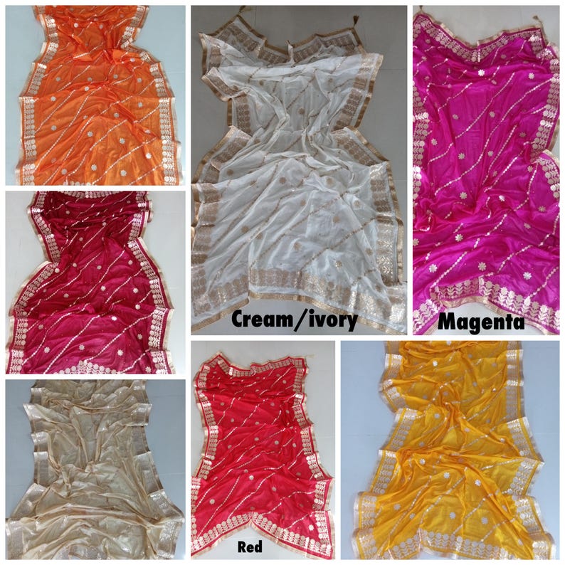 May include: Six different colored sheer scarves with gold embroidery and trim. The colors are orange, cream, magenta, beige, red, and yellow.