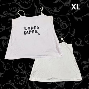 May include: A white tank top with thin spaghetti straps featuring the black text LÖDED DIPER printed on the front. The garment is labeled as size XL. A second, identical white tank top is positioned partially underneath the first one.