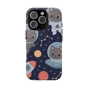 May include: A black phone case with a pattern of cats in spacesuits, planets, and stars. The case has a cutout for the camera lens.