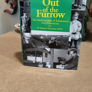 Out Of The Furrow. The Autobiography Of Kalamazoo&#39;s First Pediatrician. By H. Sidney Heersma, M.D. First Edition. 2002.