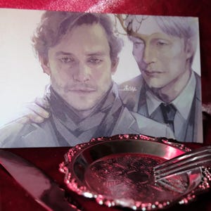 Hannibal TV-Serie Lenticular Art Card – Will Graham & Hannibal Lecter – Zwei-Ansichten-Sammlerstück